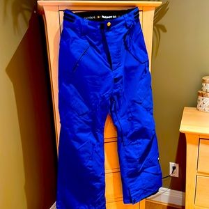 men's small ski/snowboard pants keep it real real snow company. Bright blue.